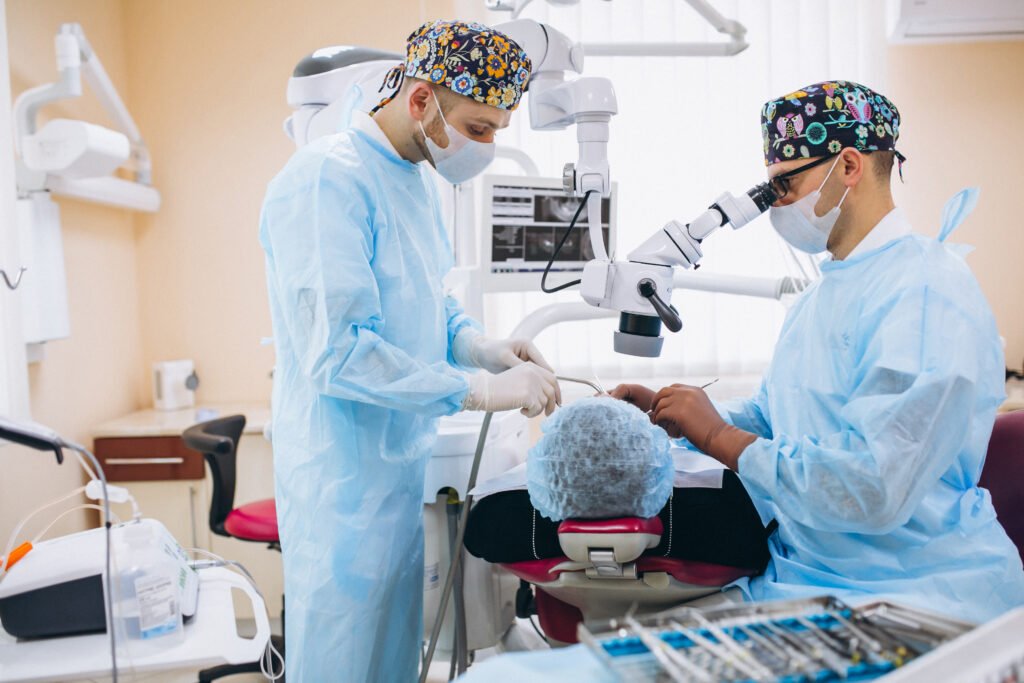 dentist with patient at a visit